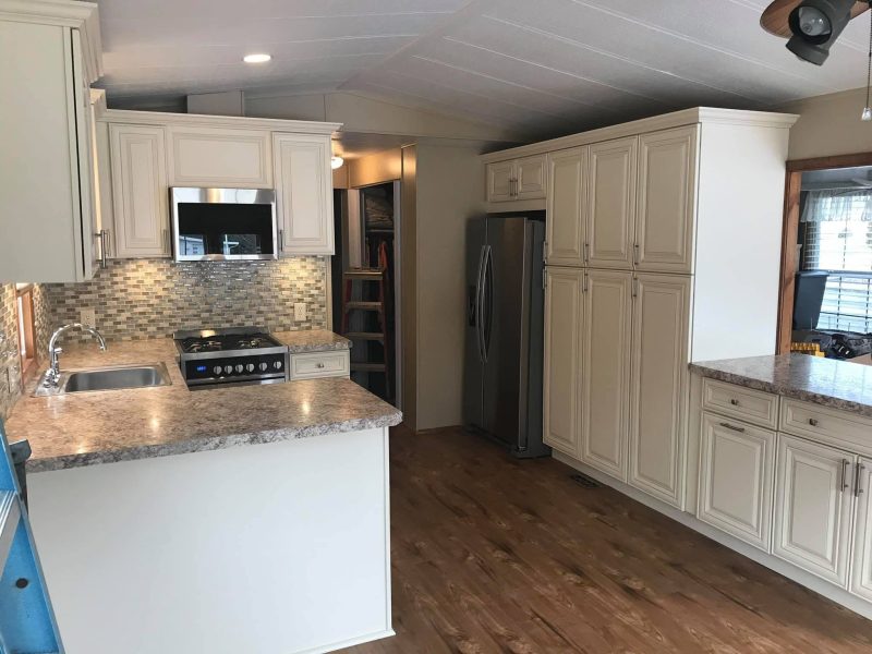 Antique White Cabinets & Mosaic Tile — photograph 2