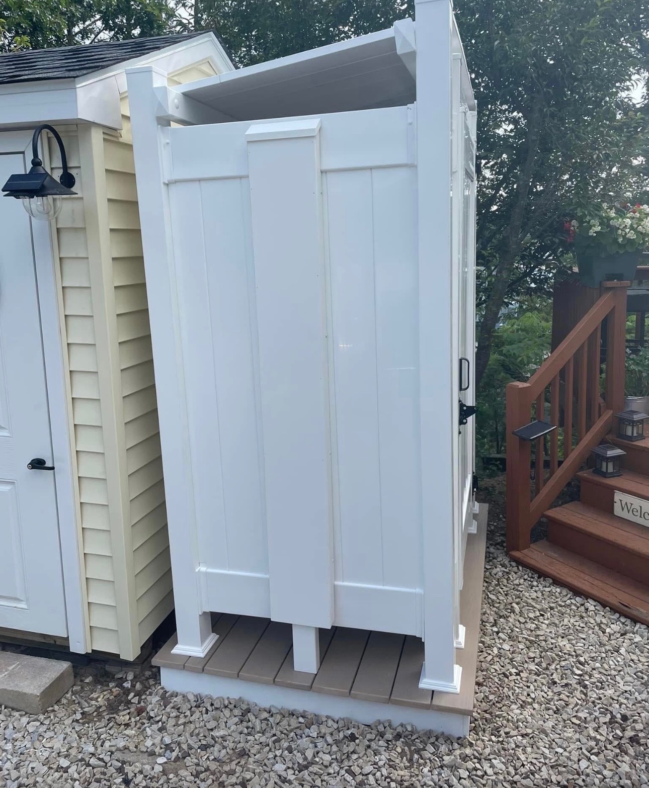 Outdoor shower built alongside a shed